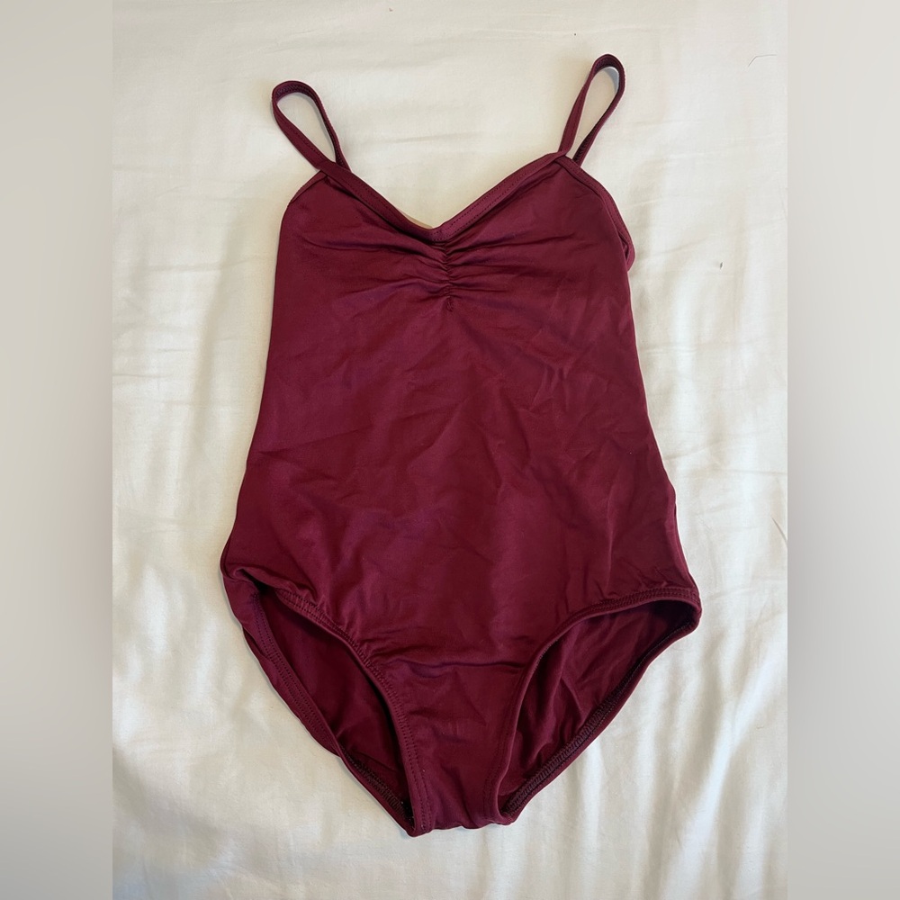Motionwear maroon burgundy leotard with mesh design and open back